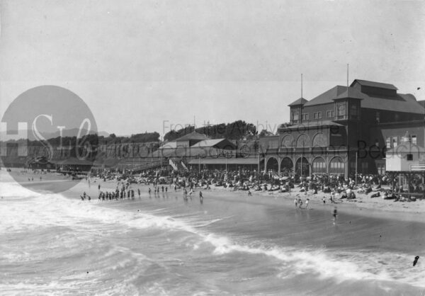 California beachfront people relaxing on the shoreline vintage
