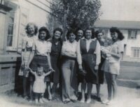 Family outside on the lawn woman's place in the spotlight