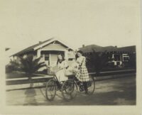 Kids riding on bikes in neighborhood